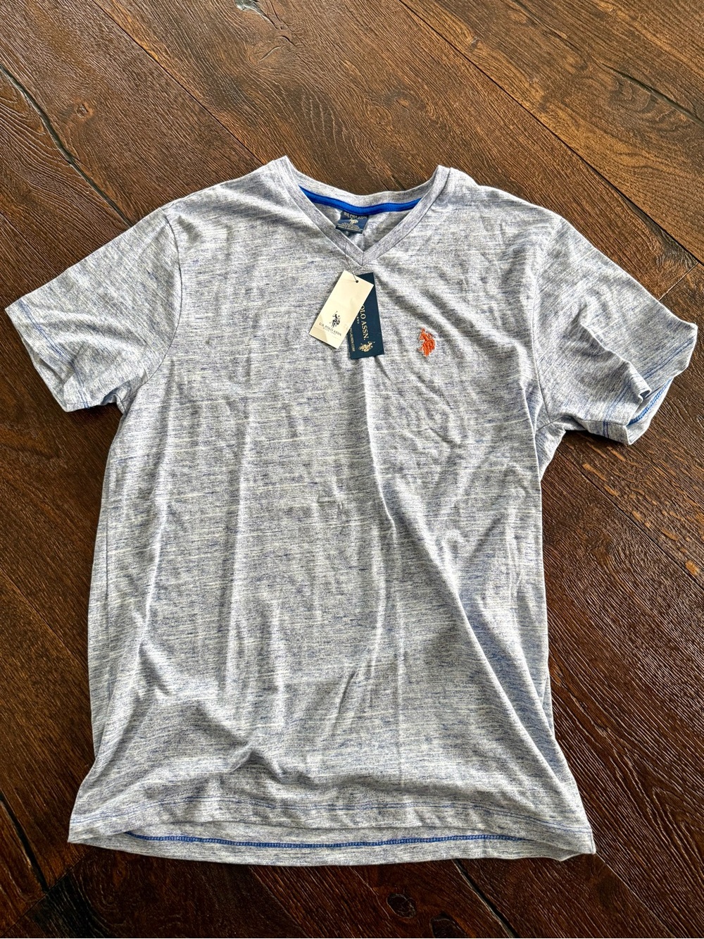 U.S. Polo Assn. Men’s V-Neck Short Sleeve Tee - Light Blue with Orange Logo